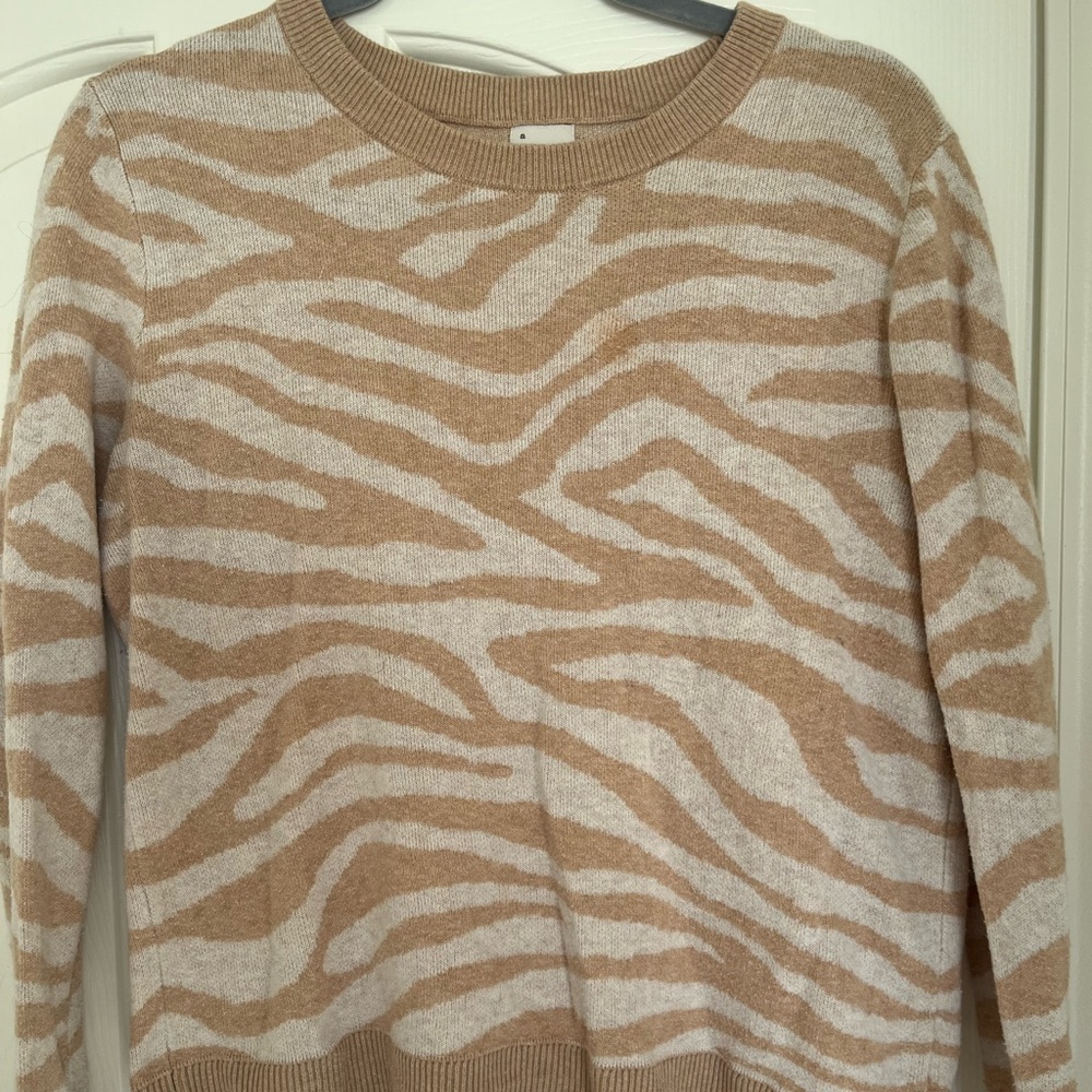 Gently used animal print sweater